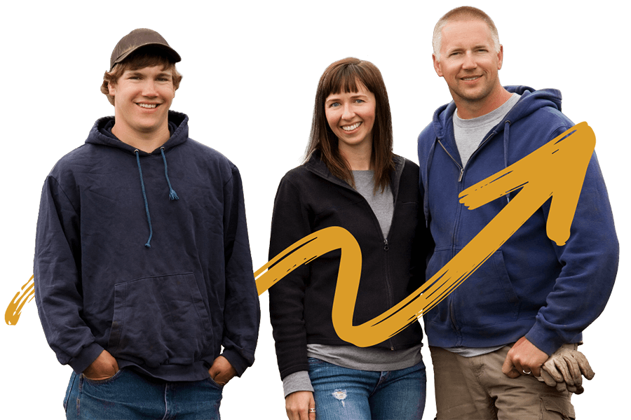 A family of farmers smiling